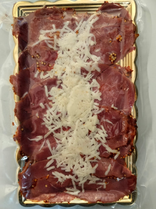 Carpaccio de Pastrami de guanaco con queso de cabra